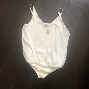 White bodysuit top.